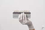 dentist showing dental implants