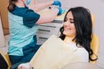 a lady visits dental clinic for restorative dentistry treatment